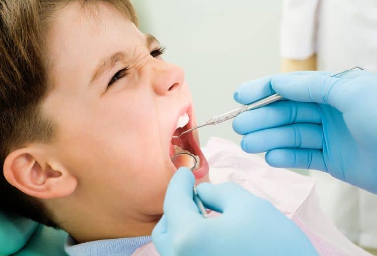 Dentist checking for cavities | My Dental Advocate